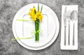 Festive able place setting with spring flowers Royalty Free Stock Photo