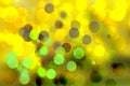A festive abstract gradient green yellow brown background texture with glitter defocused sparkle bokeh circles. Card concept for Royalty Free Stock Photo