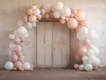 Festive arch made of pearl-colored balloons in pastel colors