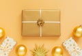 Festive background with big gold gift box Royalty Free Stock Photo