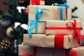 Gift stack under tree Royalty Free Stock Photo