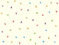 Festive background with scattered colorful confetti.