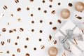 Festive background with sparkles, Christmas balls, gift box and streamer Royalty Free Stock Photo