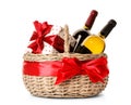 Festive basket with bottles of wine and gift