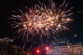 Festive beautiful fireworks at night over the city Royalty Free Stock Photo