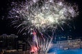 Festive beautiful fireworks at night over the city Royalty Free Stock Photo