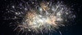 Festive beautiful fireworks at night over the city Royalty Free Stock Photo