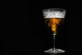 Festive beautiful misted wine glass with vintage patterns, black background