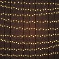 Beautiful Warm White String Lights on Dark Brown Wood