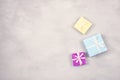 Festive, birthday, Gift pastel minimal background. Multicolored Gift boxes on gray cement background. Wedding, elegant, Love,