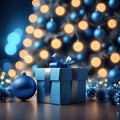 Festive blue box with a red ribbon and a large blue ball against the background of a Christmas tree with bokeh. Christmas and New Royalty Free Stock Photo