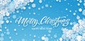 Festive blue Christmas background with paper snowflakes. Christmas Papercut background design for postcard, banner