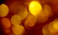 Festive blurred background, bokeh, gold, orange, red, dark, Christmas, new year, night, lights, circles Royalty Free Stock Photo