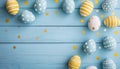 Festive border of painted pastel easter eggs with white decorations on light blue wooden table. Greeting card, banner format