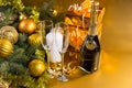 Festive Bottle of Champagne with Glasses and Gifts Royalty Free Stock Photo