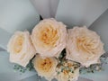 festive bouquet flowers yellow roses delicate background paper emerald Royalty Free Stock Photo