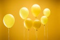 Festive bright minimalistic decorative balloons on yellow background.
