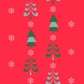 Festive bright seamless pattern of snowflakes and Christmas stylized fir trees on a red background, vector Royalty Free Stock Photo