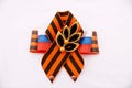 Festive brooch with a St.George`s Ribbon