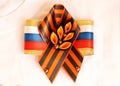 Festive brooch with a St.George`s Ribbon