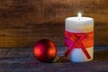 Festive burning Christmas candle flame. Royalty Free Stock Photo