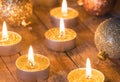 Golden Advent candles with glittering christmas balls Royalty Free Stock Photo