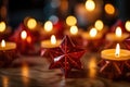 festive candles lit in star-shaped candle holders