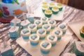 Festive candy bar for boy birthday party. Blue cupcakes with bears and Teenage Mutant Ninja Turtles, bombonieres. Royalty Free Stock Photo