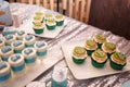 Festive candy bar for boy birthday party. Blue cupcakes with bears and Teenage Mutant Ninja Turtles, bombonieres. Sweets Royalty Free Stock Photo