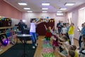 A festive charity event dedicated to the birthday of a charity organization. Animators show children a soap bubble show.
