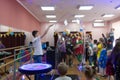 A festive charity event dedicated to the birthday of a charity organization. Animators show children a soap bubble show.