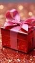 Festive charm Red gift box adorned with shimmering holiday tinsel