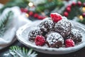 Festive Chocolate Truffles with Raspberries on a Decorated Table