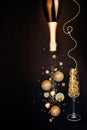 Festive Christmas background. Bottle of champagne with spray of sparkles Christmas decorations. Happy new year concept Royalty Free Stock Photo