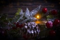 Festive christmas background, candle, christmas tree branch Royalty Free Stock Photo