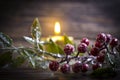 Festive christmas background decor celebrate brightholiday, candle, christmas tree branch Royalty Free Stock Photo