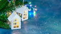 Festive christmas background with decorative wooden home toy lights Royalty Free Stock Photo