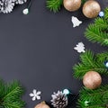 Festive Christmas background with fir branches, giftboxes, decorations, copy space, top view Royalty Free Stock Photo