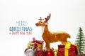 Festive christmas background with presents and reindeer Royalty Free Stock Photo