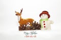 Festive christmas background with presents and reindeer and snowman Royalty Free Stock Photo