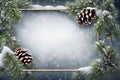 Festive Christmas background. their frame is fir branches, covered snow, decorated with pine cones. copy space Royalty Free Stock Photo