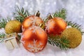 Festive Christmas balls, small box with present and fir branches Royalty Free Stock Photo