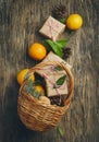 Festive Christmas Basket with gift boxes and tangerines Royalty Free Stock Photo