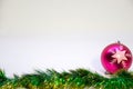 Pink christmas ball, and Christmas decoration on a white background