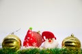 Red and two gold christmas balls, and Christmas decoration on a white background