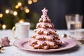 festive Christmas cookies in the shape of a voluminous Christmas tree with pink glaze