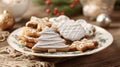festive christmas cookies with white icing on decorative plate Royalty Free Stock Photo