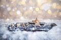 Third Advent Sunday and wooden XMAS letters in snow