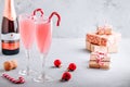 Festive Christmas drink Peppermint Bark Mimosa cocktail with champagne or prosecco and candy cane Royalty Free Stock Photo