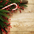 Festive Christmas fir tree on wooden background with space for your text Royalty Free Stock Photo